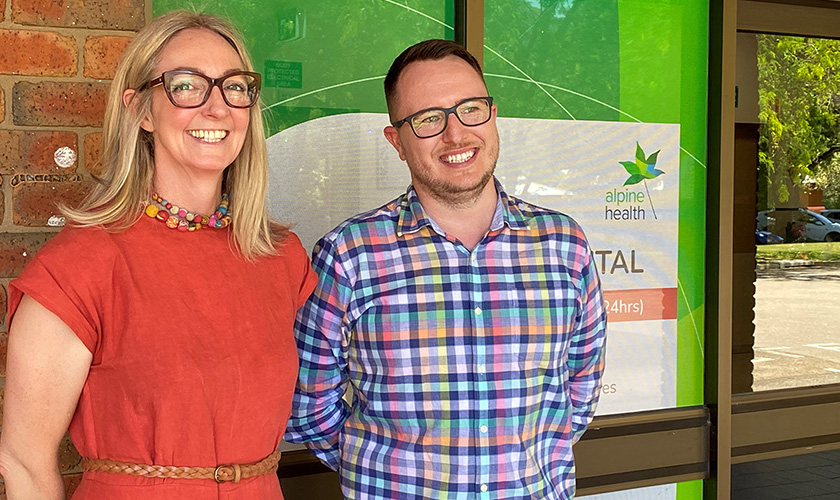 Lisa Darmanin with Rhys Gloury standing in front of the Bright Hospital entrance