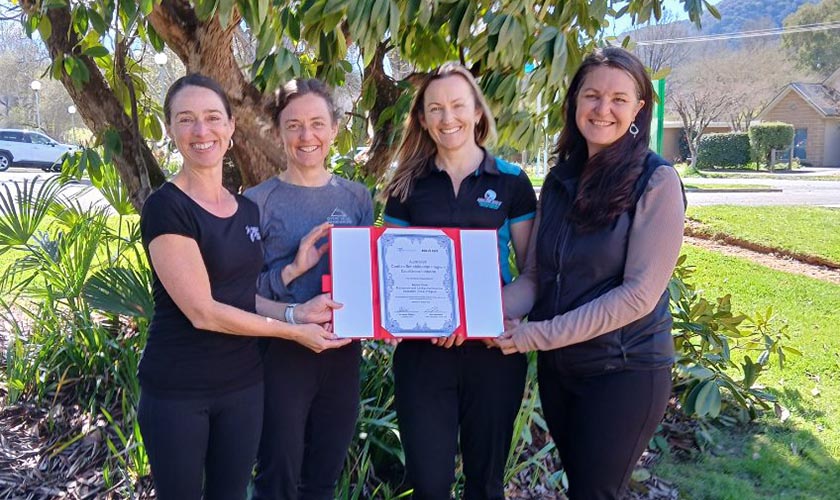 PACE team holding a certificate PACE team holding a certificate